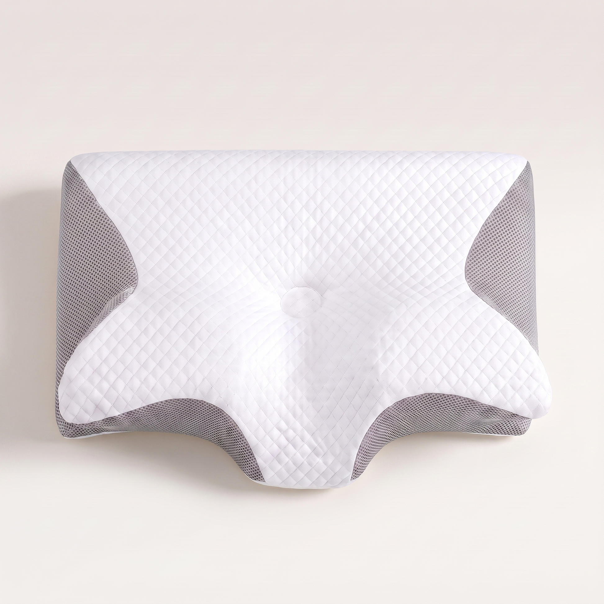 NeckRest nekkussen van bovenaf, met de uitsparingen voor je armen en de verdieping in het midden